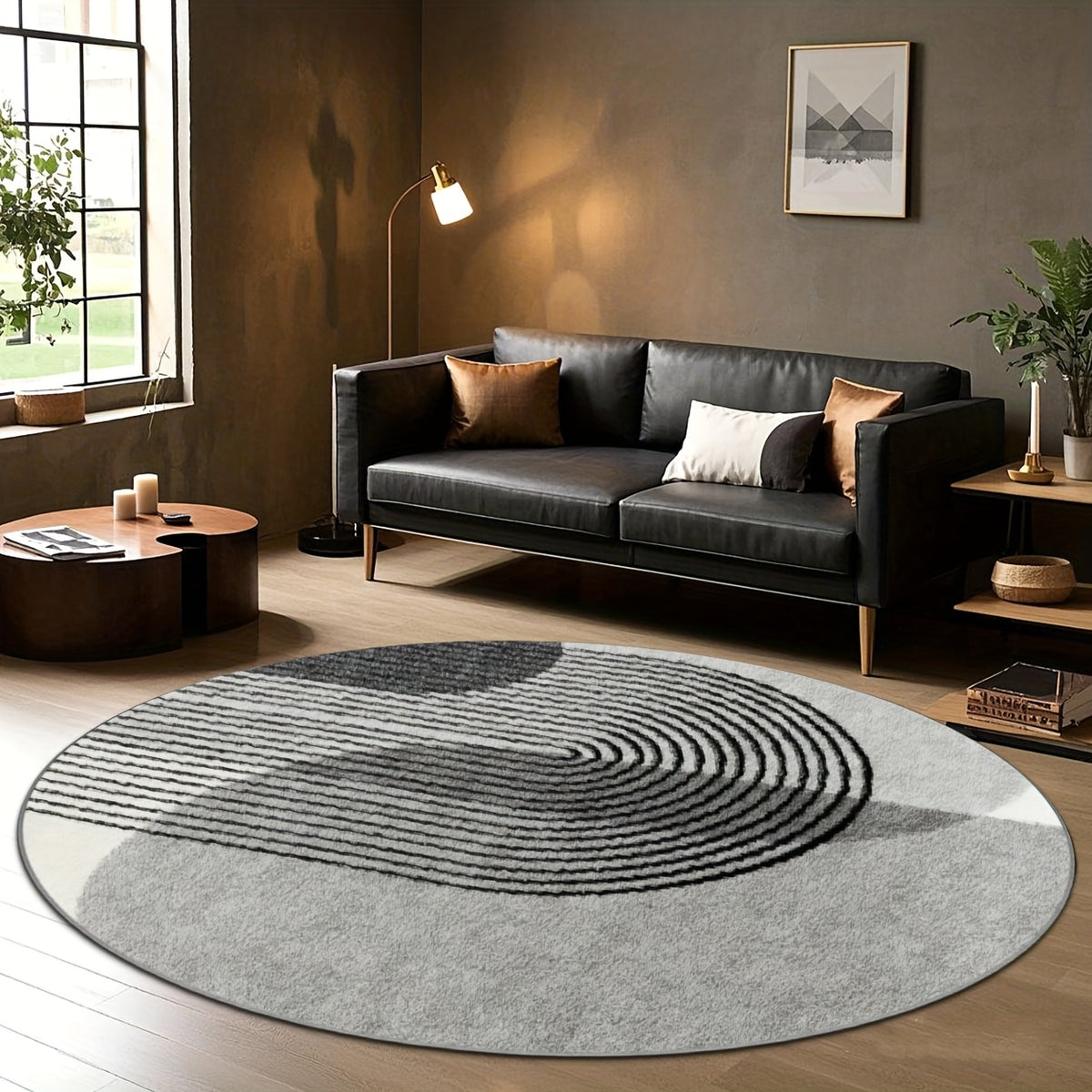 Grand tapis rond gris et noir à arcs concentriques en relief