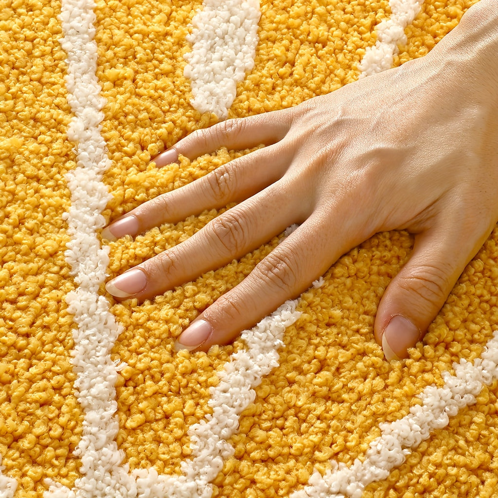 Tapis de bain rond jaune motif tranche d'orange, dos TPR