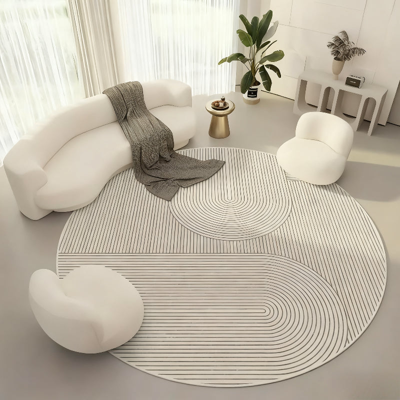 Tapis rond crème de 110 cm strié façon jardin sec japonais