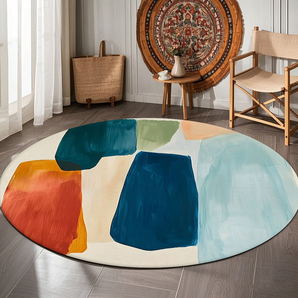 Tapis rond à aplats peints, bleu canard, orange et sauge