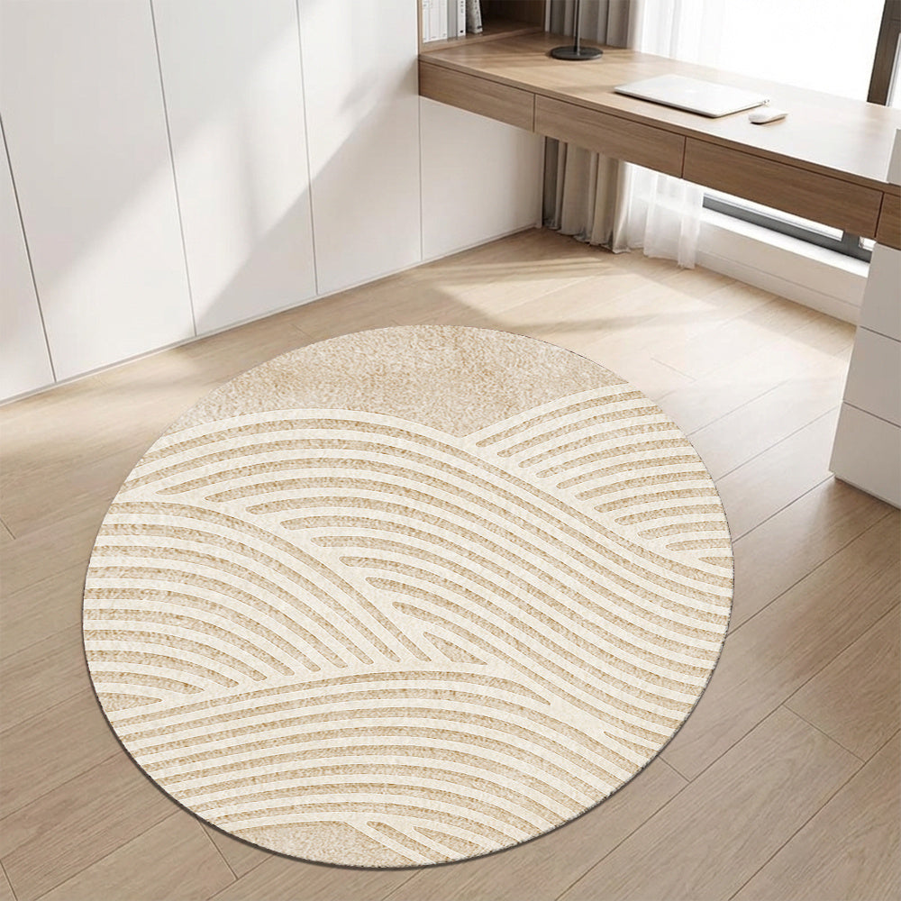 Tapis rond beige aux arcs de sable ratissé, cinq diamètres