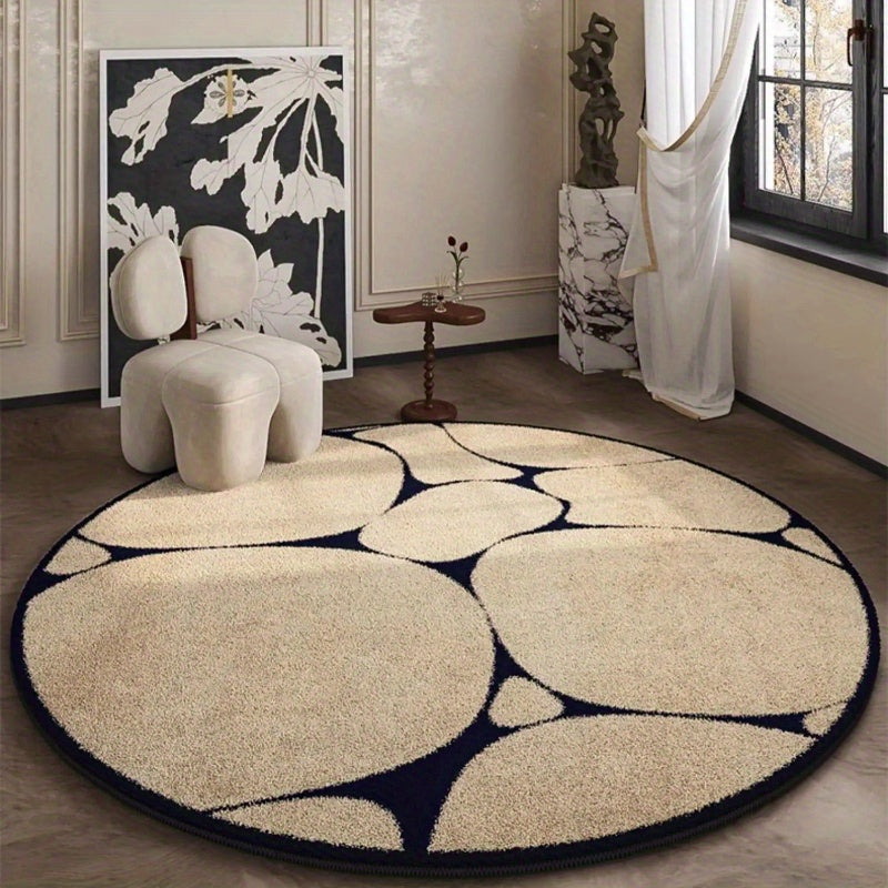 Tapis rond beige et bleu nuit, galets ou lignes au choix