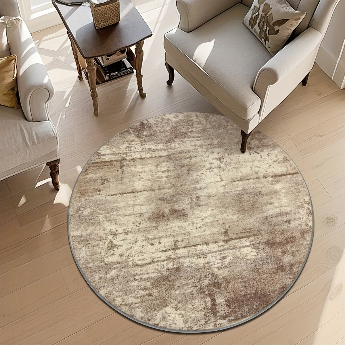 Tapis rond beige à effet vieilli, allure de tapis ancien
