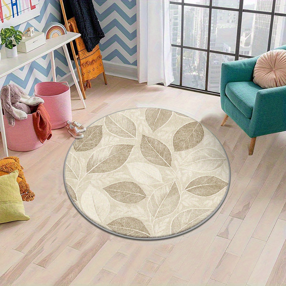 Tapis rond beige, feuillage nervuré et dos moucheté noir