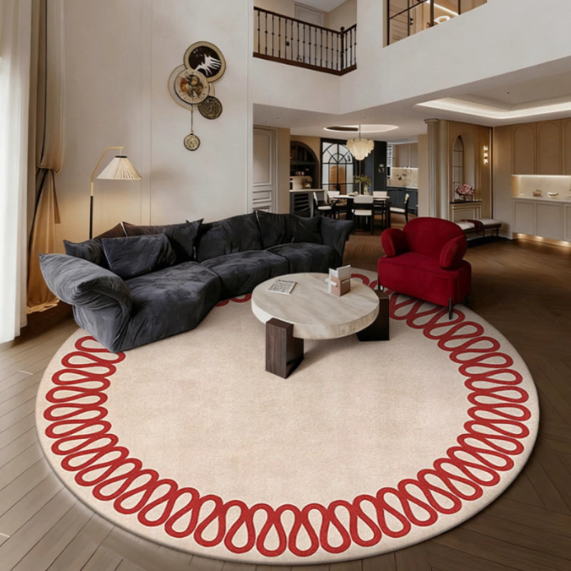 Tapis rond beige à guirlande rouge bouclée, velours 10 mm