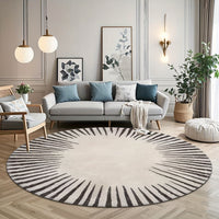 Tapis rond écru et noir à soleil tracé au pinceau, tissu plat