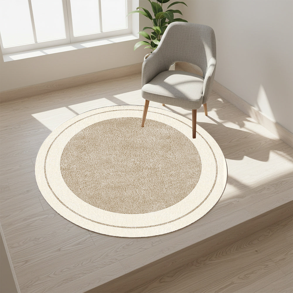 Tapis rond beige sable à fin liseré crème, Ø 110 à 160 cm