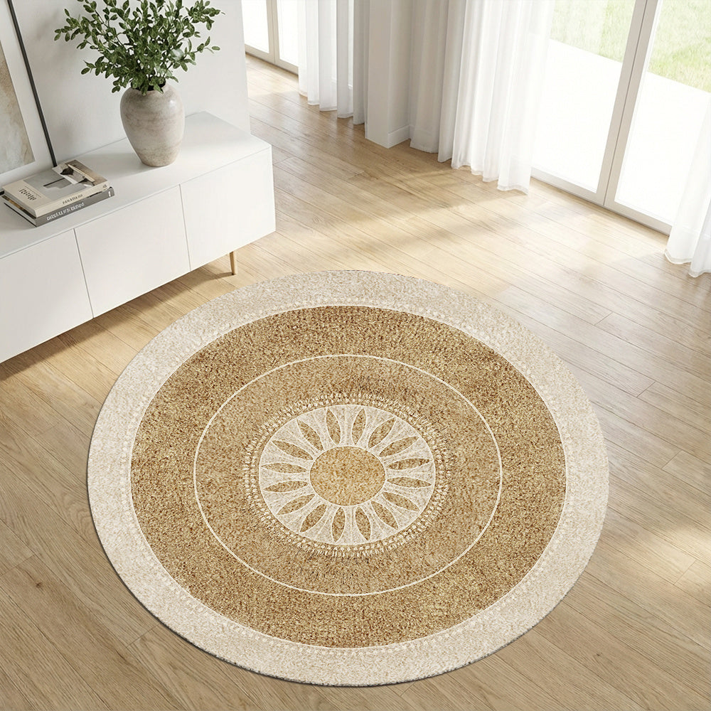 Tapis rond beige à médaillon solaire, bordure crème perlée