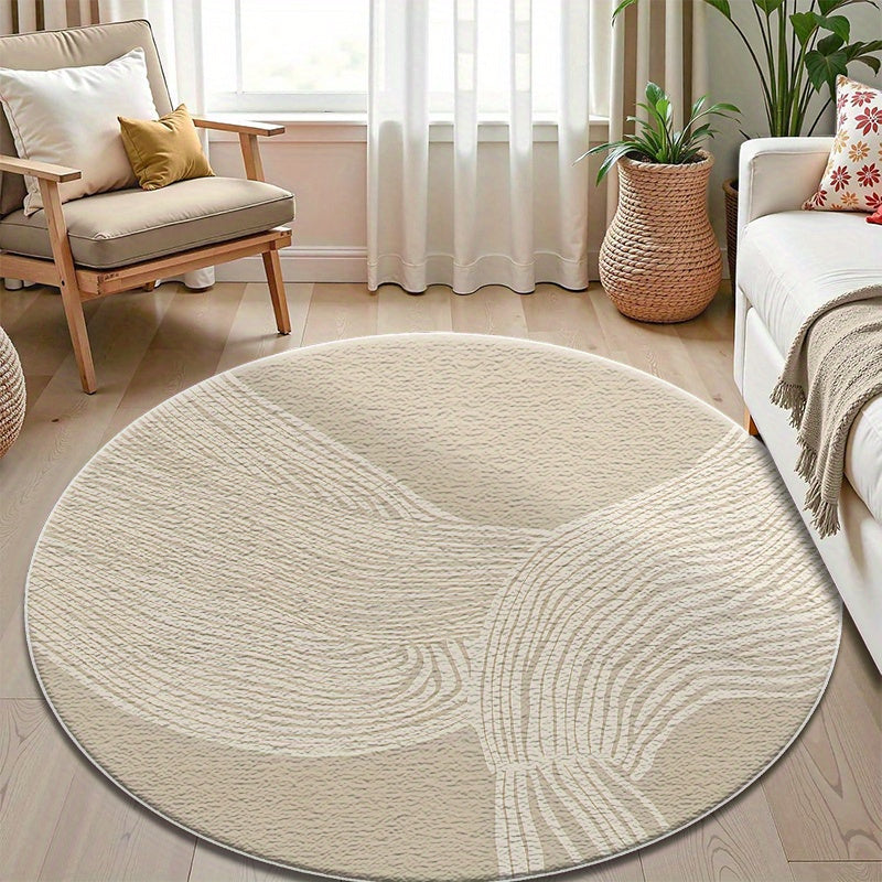 Tapis rond beige à grandes courbes sculptées dans le velours