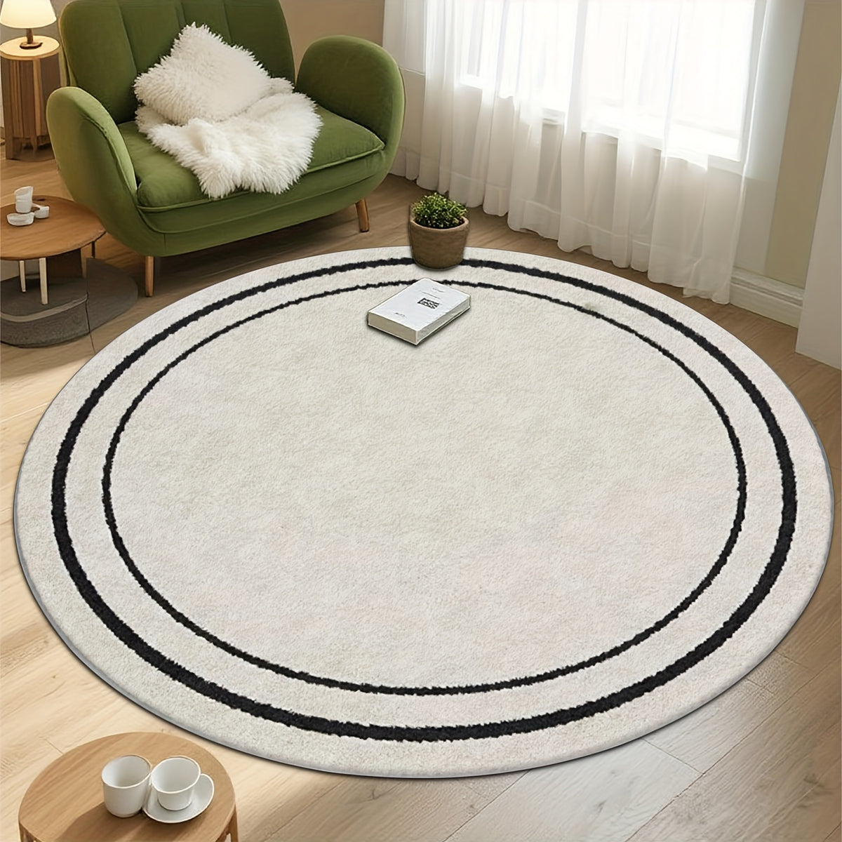 Tapis rond blanc à deux anneaux noirs, style minimaliste