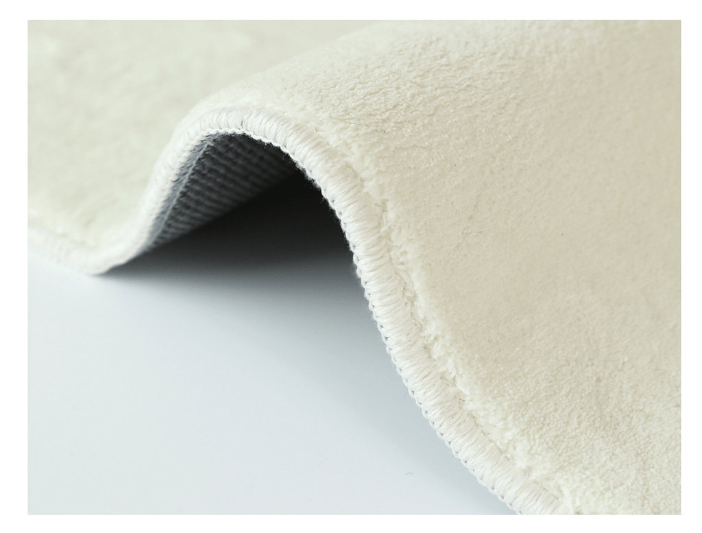 Tapis rond blanc à taches de vache noires, deux diamètres