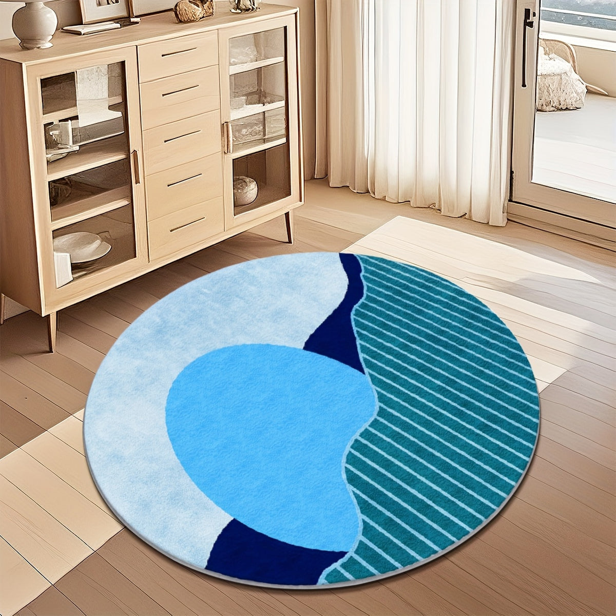 Tapis rond bleu Ø 200 cm, aplats francs et rayures fines