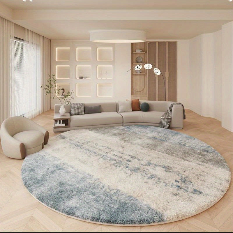 Tapis rond bleu délavé ou greige à effet de fresque usée