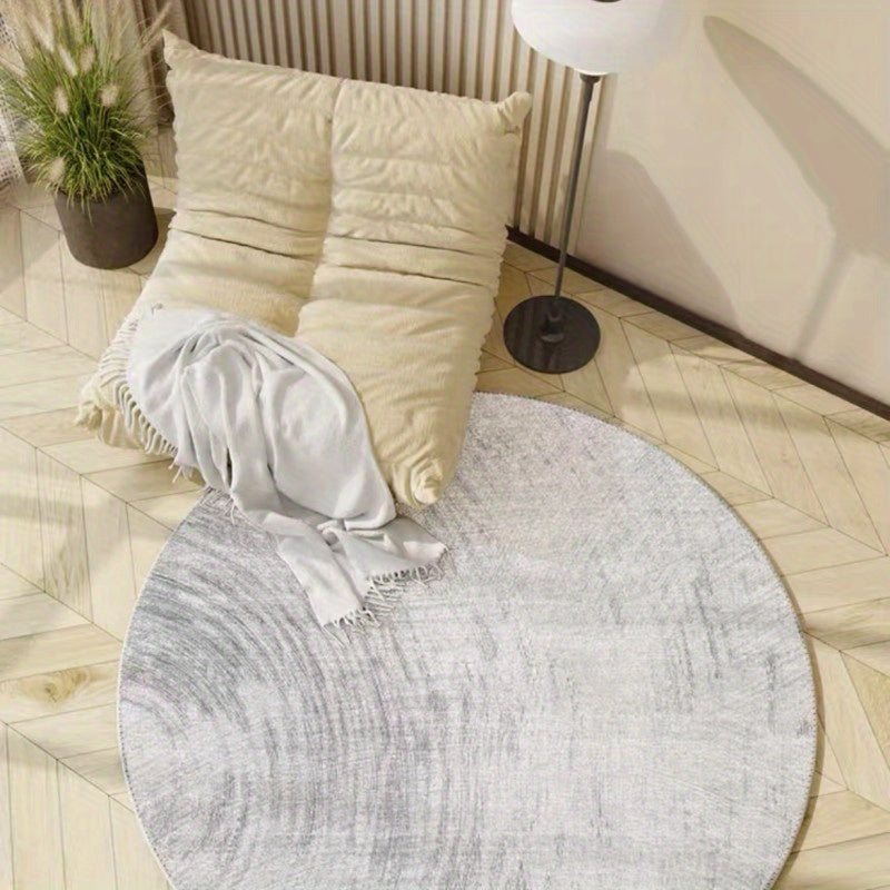 Tapis rond bleu délavé ou greige à effet de fresque usée