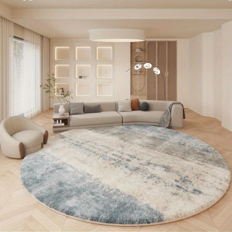 Tapis rond bleu délavé ou greige à effet de fresque usée