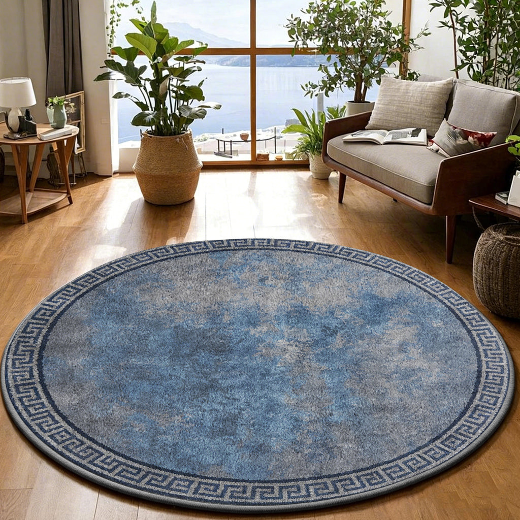 Tapis rond bleu gris effet pierre usée, bordure grecque