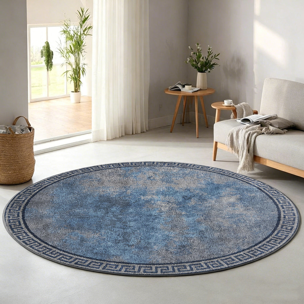 Tapis rond bleu gris effet pierre usée, bordure grecque