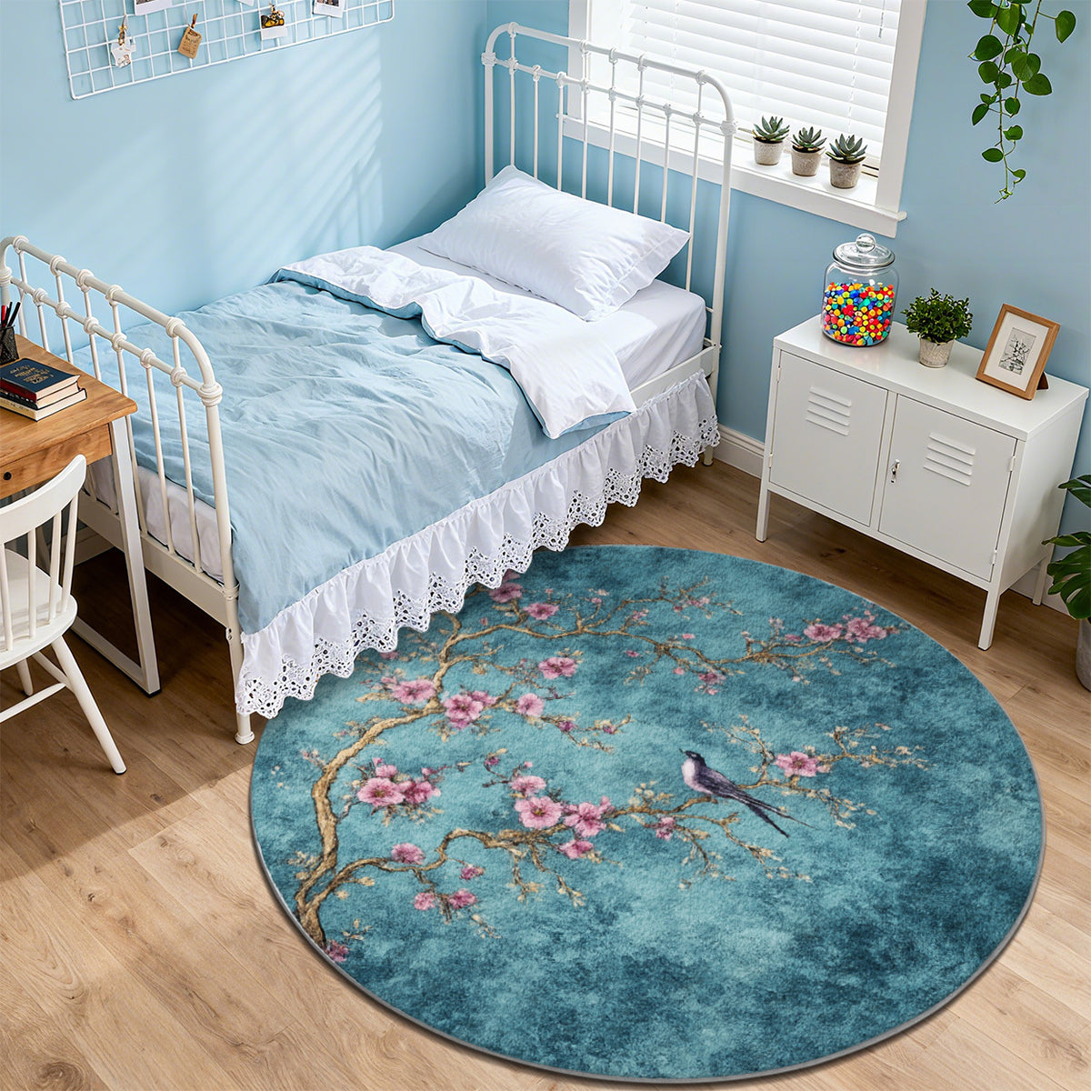 Tapis rond bleu paon à grandes branches de cerisier fleuries