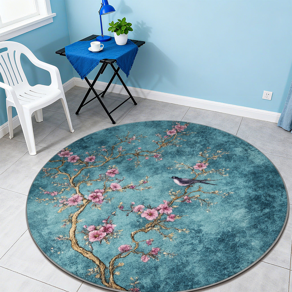 Tapis rond bleu paon à grandes branches de cerisier fleuries