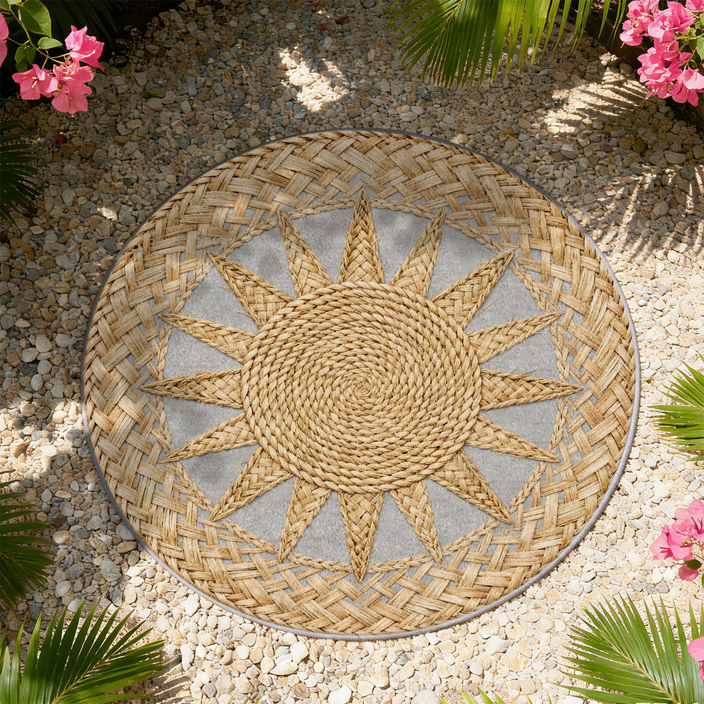 Tapis rond bohème à soleil tressé sur fond gris pierre clair