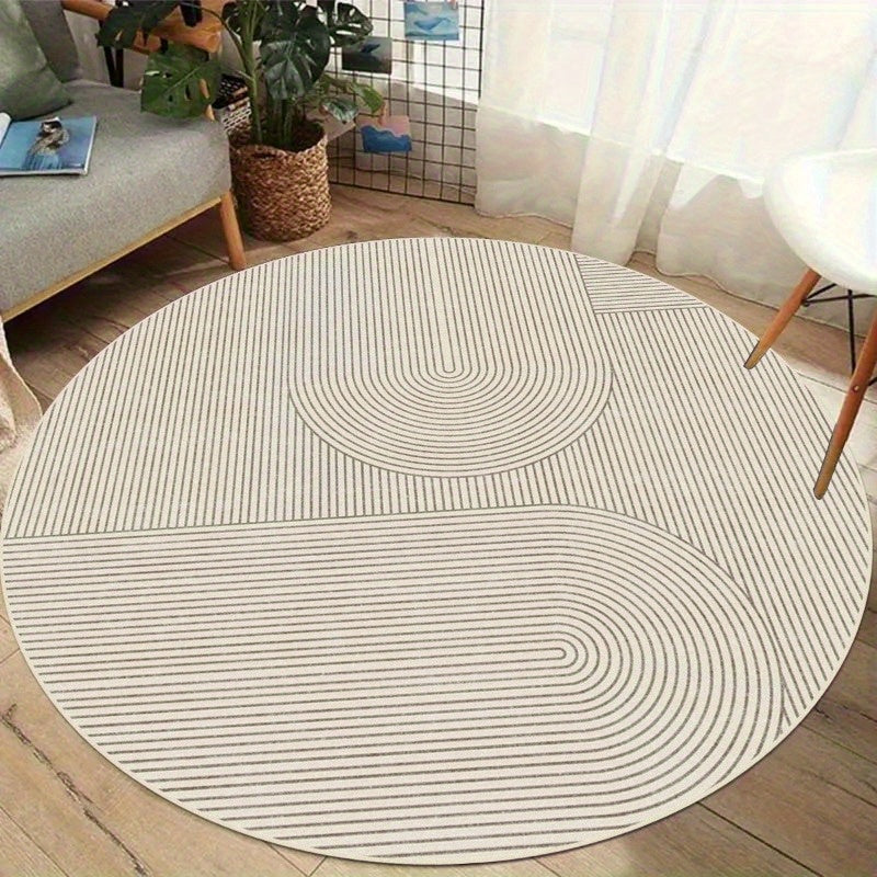 Tapis rond crème à arcs peignés, velours bouclé 900 g/m²