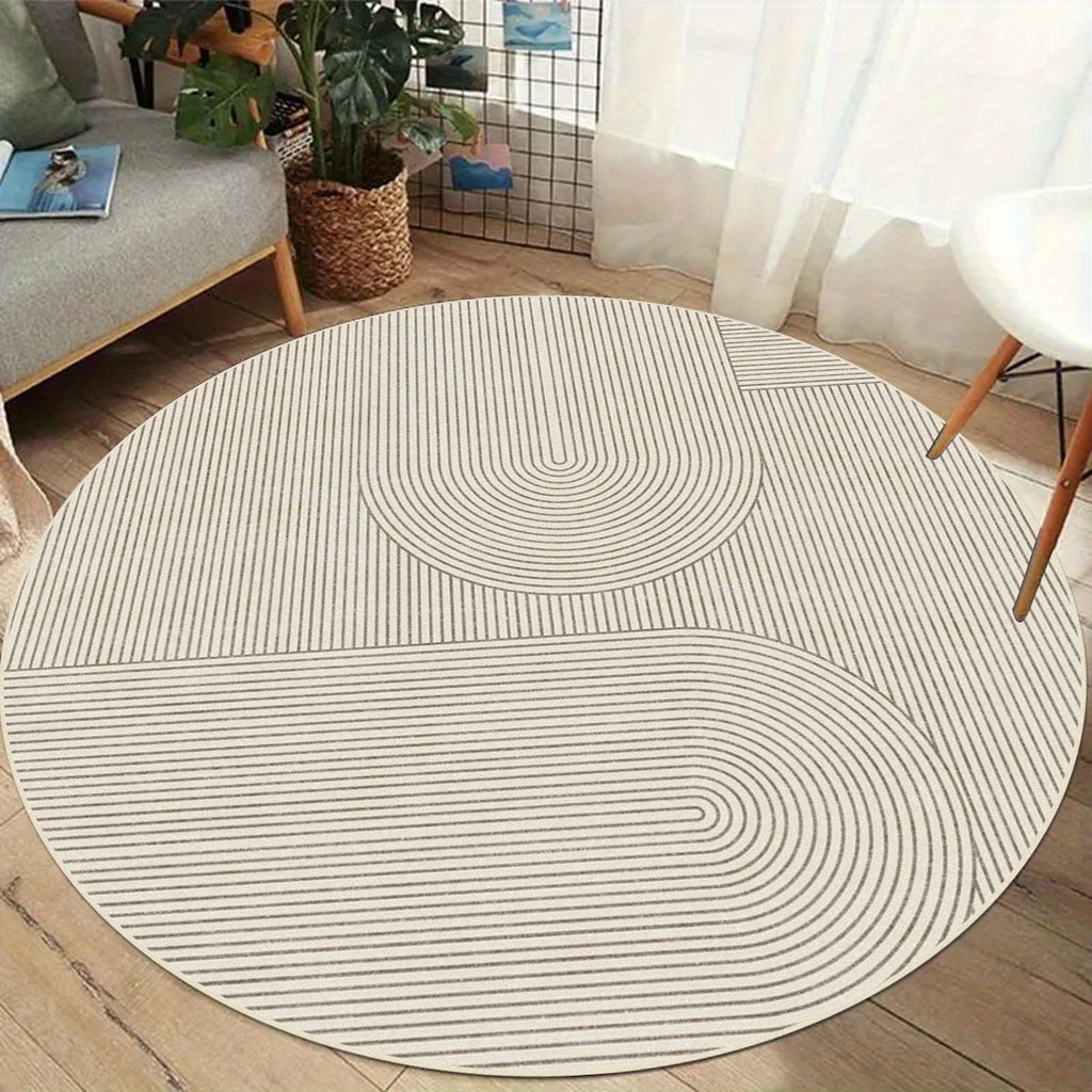 Tapis rond crème à arcs peignés, velours bouclé 900 g/m²