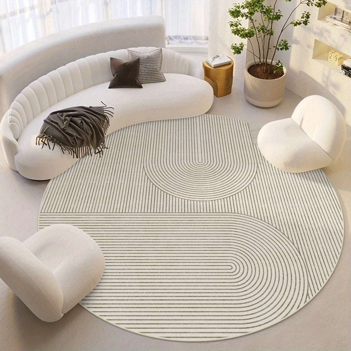 Tapis rond crème à arcs peignés, velours bouclé 900 g/m²