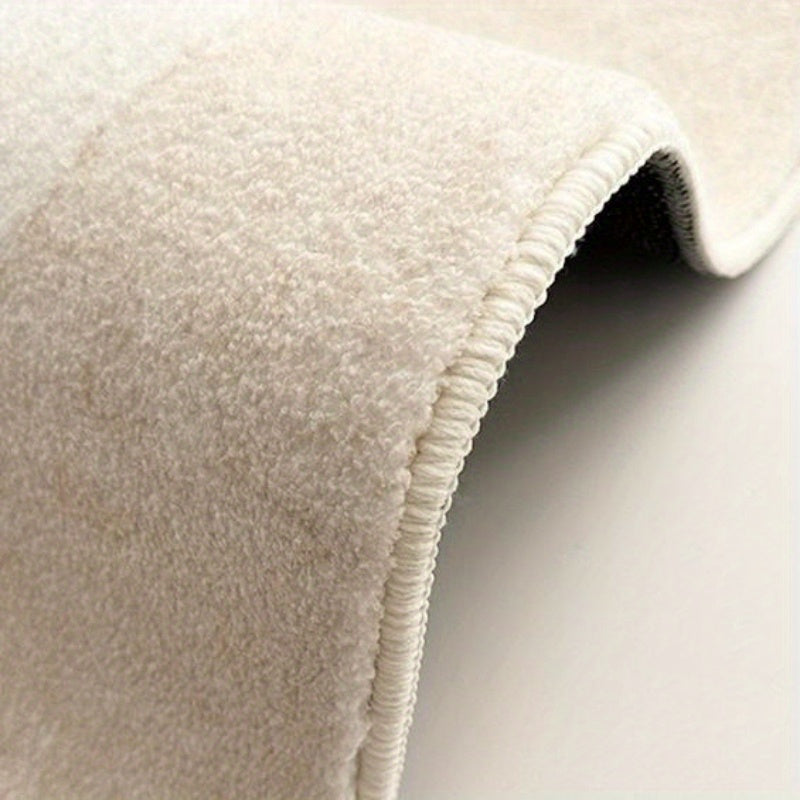 Tapis rond crème à arcs peignés, velours bouclé 900 g/m²