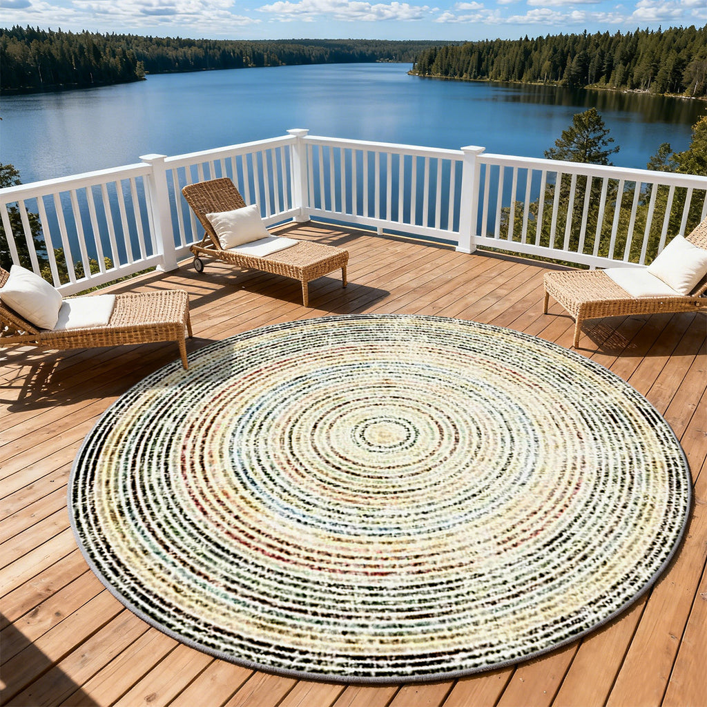 Tapis rond crème chiné à cercles mouchetés multicolores