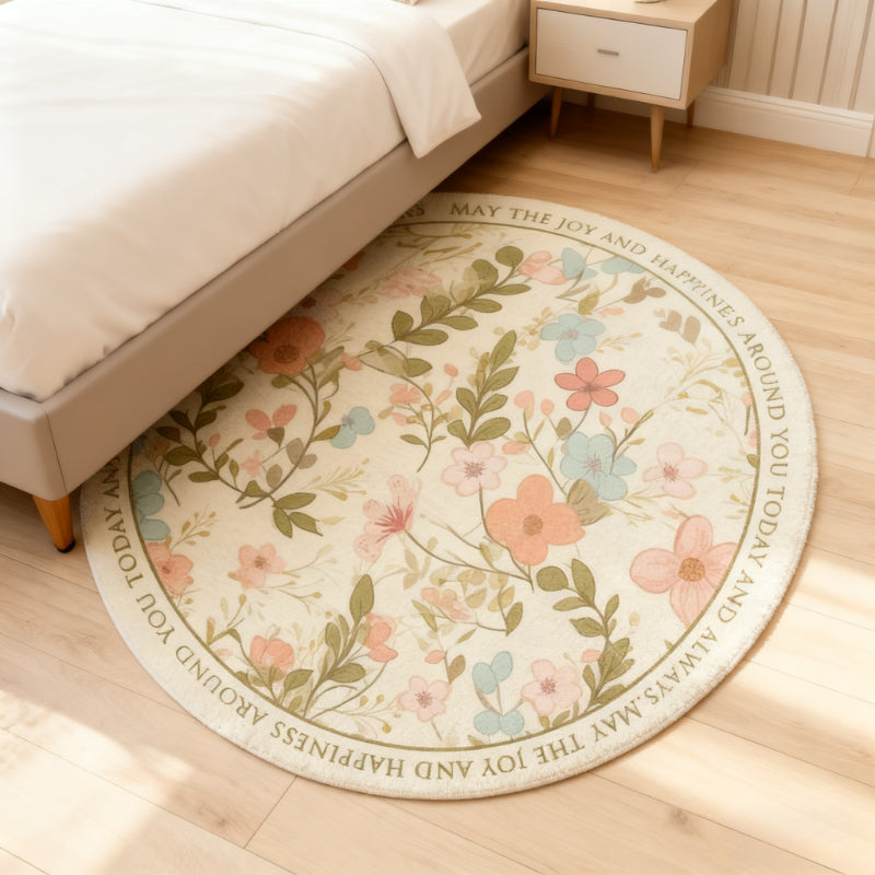 Tapis rond crème à fleurs pastel et bordure calligraphiée