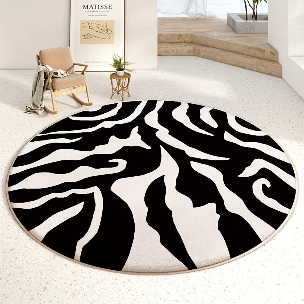 Tapis rond crème traversé de larges vagues noires tissées