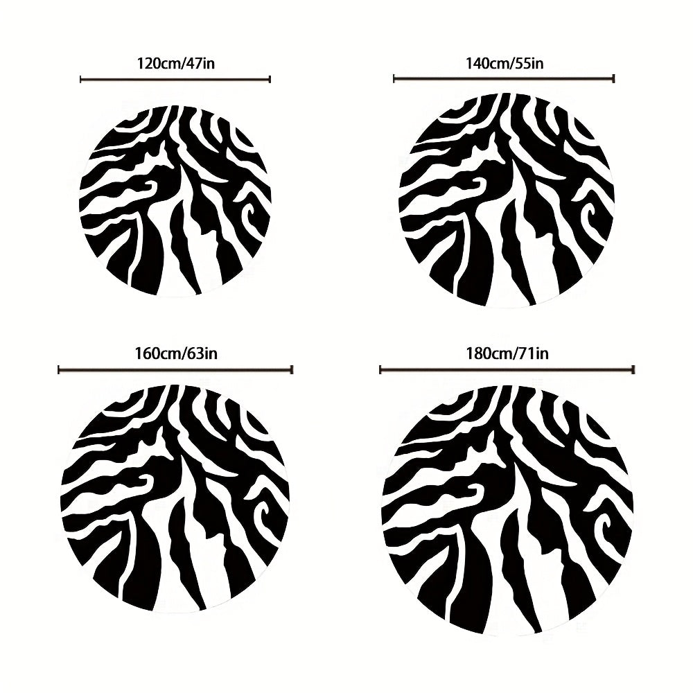 Tapis rond crème traversé de larges vagues noires tissées