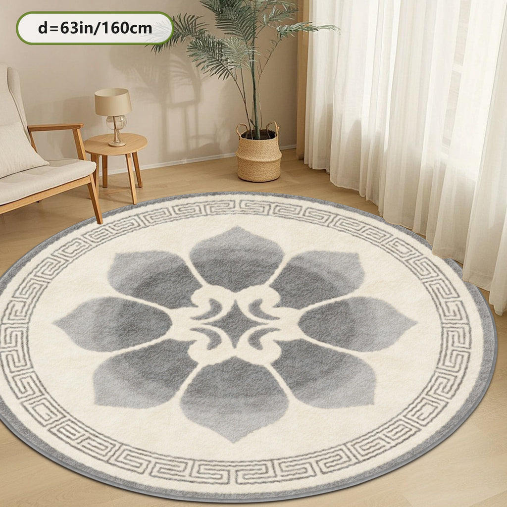 Tapis rond crème et gris à lotus central, frise à grecque