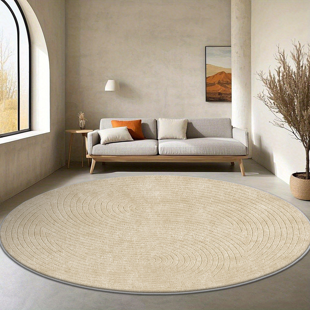 Tapis rond crème à sillons concentriques, onze cotes vendues
