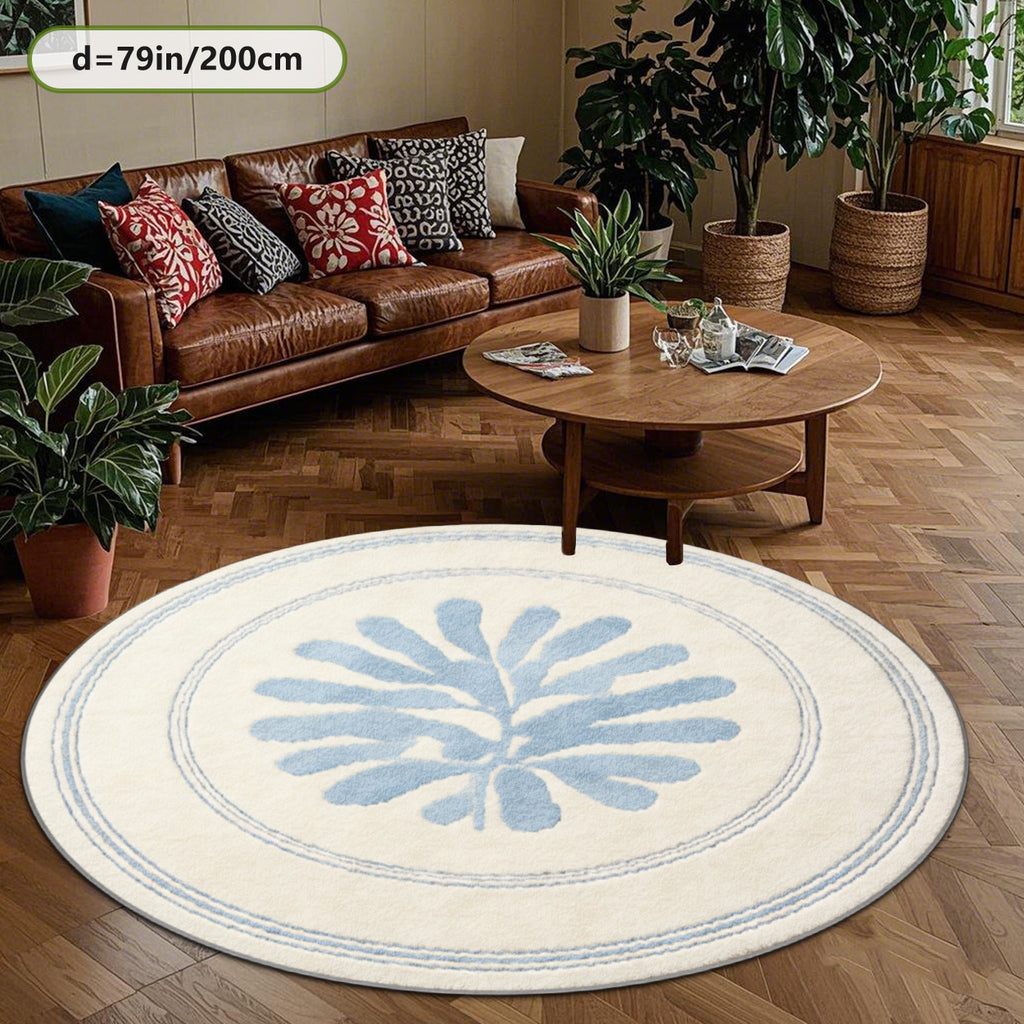 Tapis rond crème à feuillage bleu découpé, trois diamètres