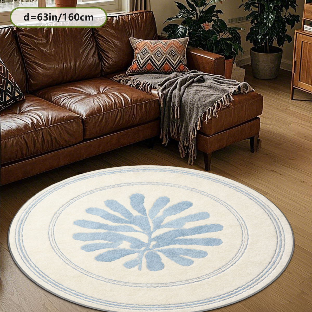 Tapis rond crème à feuillage bleu découpé, trois diamètres