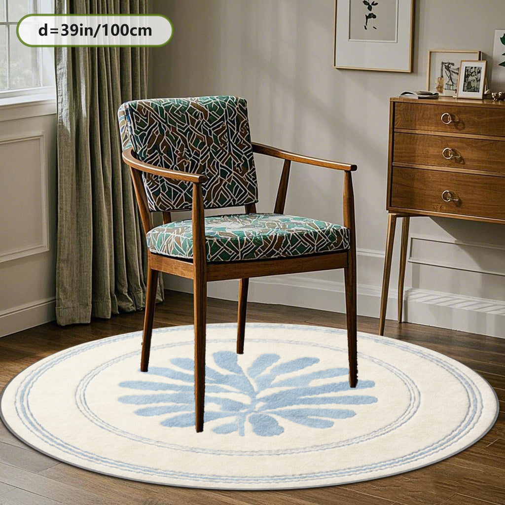 Tapis rond crème à feuillage bleu découpé, trois diamètres