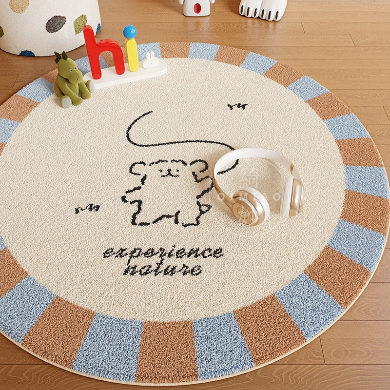 Tapis rond crème à ours au trait noir, bordure à créneaux
