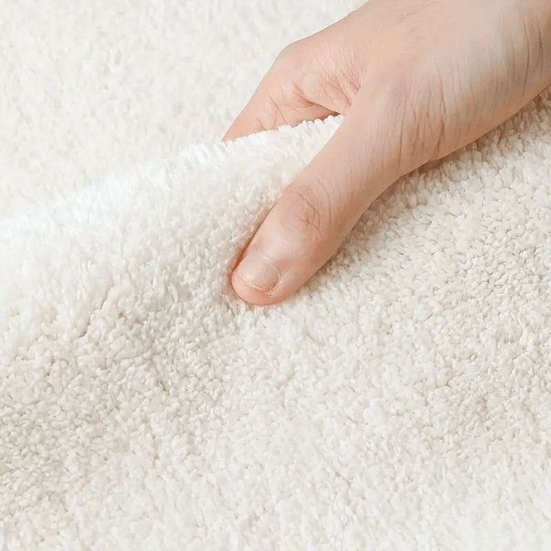 Tapis rond crème à teckel en pull, bordure à traits bruns