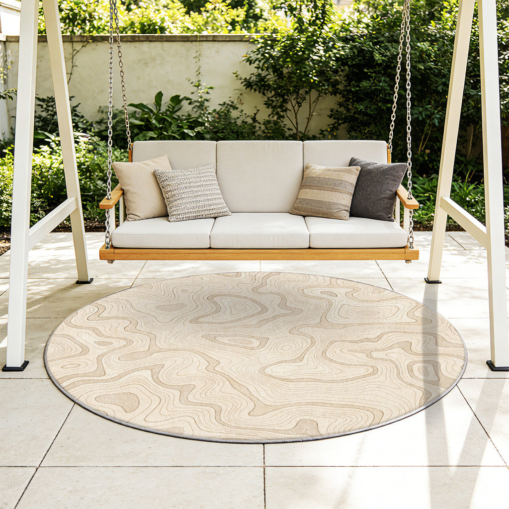 Tapis rond écru à courbes de niveau ton sur ton discrètes