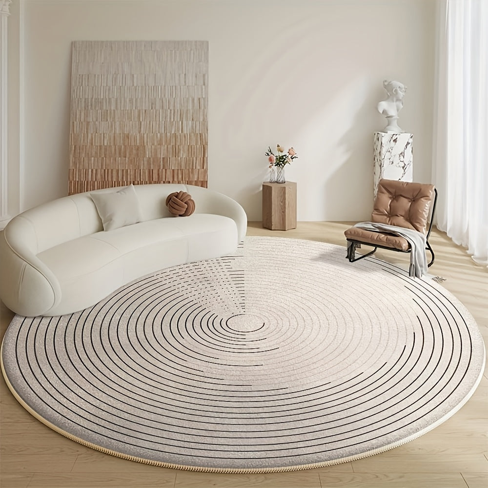 Tapis rond écru à fines lignes en tourbillon, tissé à plat