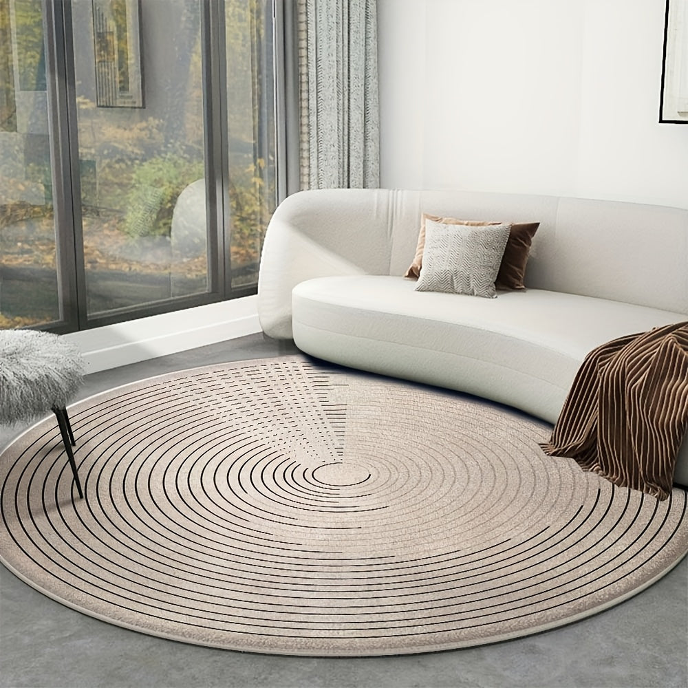 Tapis rond écru à fines lignes en tourbillon, tissé à plat