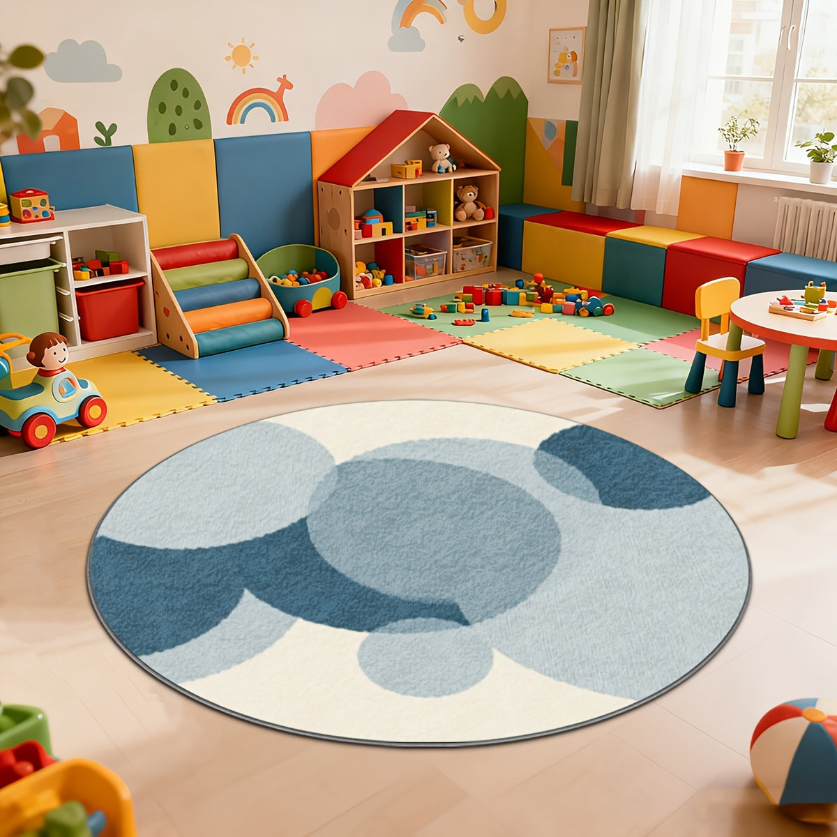 Tapis rond d'enfant à cercles bleus superposés sur crème