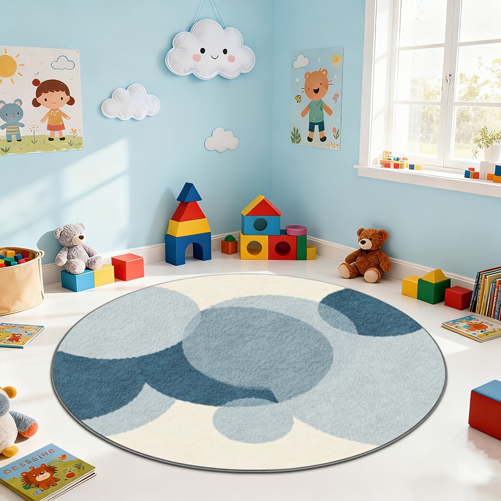 Tapis rond d'enfant à cercles bleus superposés sur crème