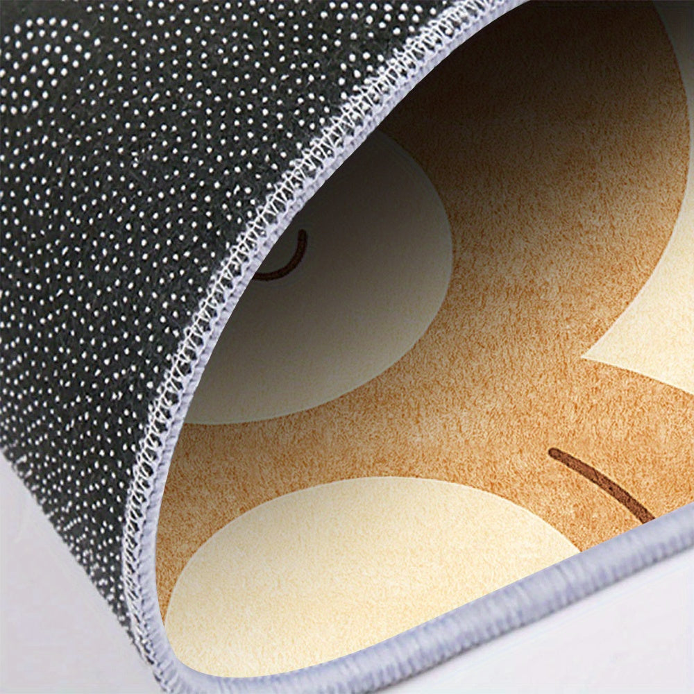 Tapis rond à motif ourson beige, envers à pois photographié