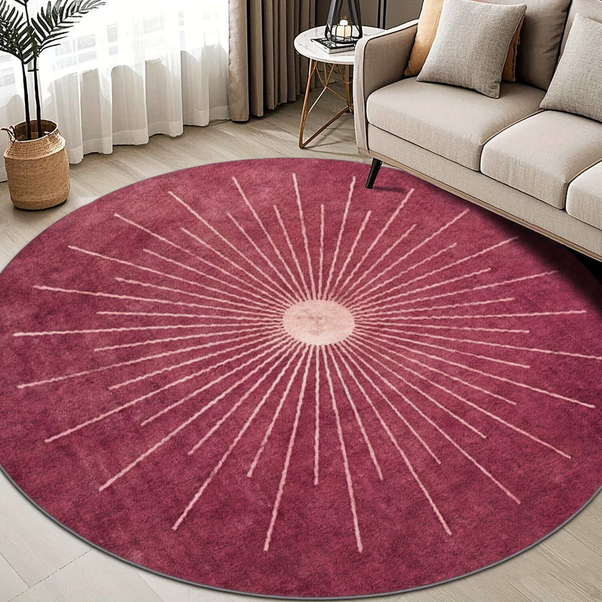 Tapis rond rose framboise à rayons, motif soleil central