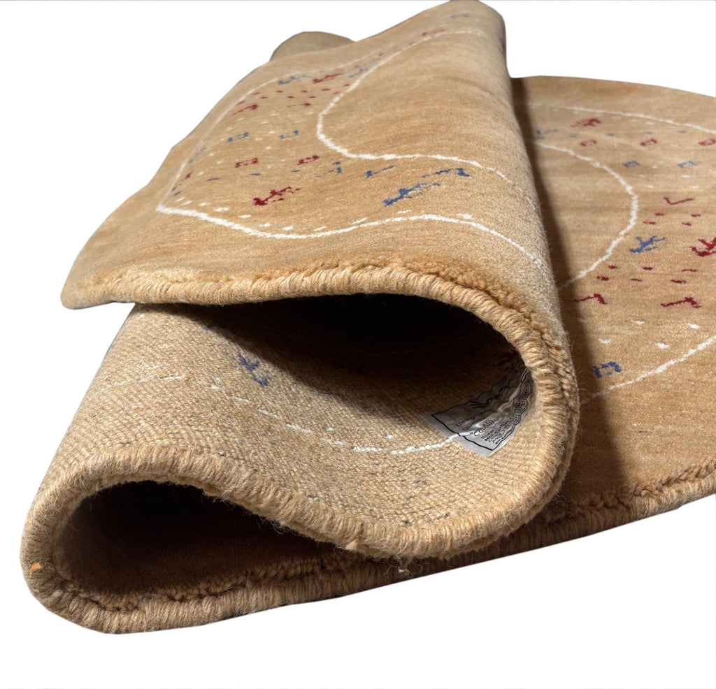 Tapis rond Gabbeh en laine nouée main 120 cm, ton camel