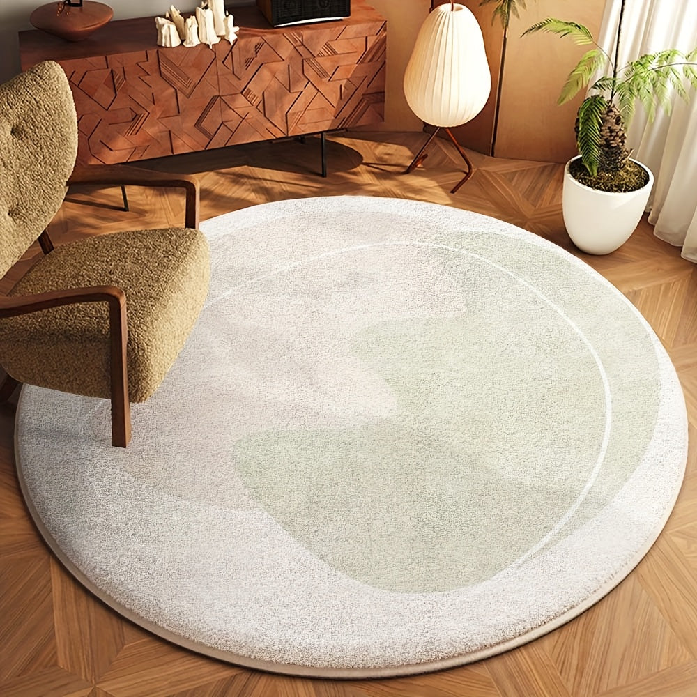Tapis rond ivoire à grand galet sauge, peinture en lavis