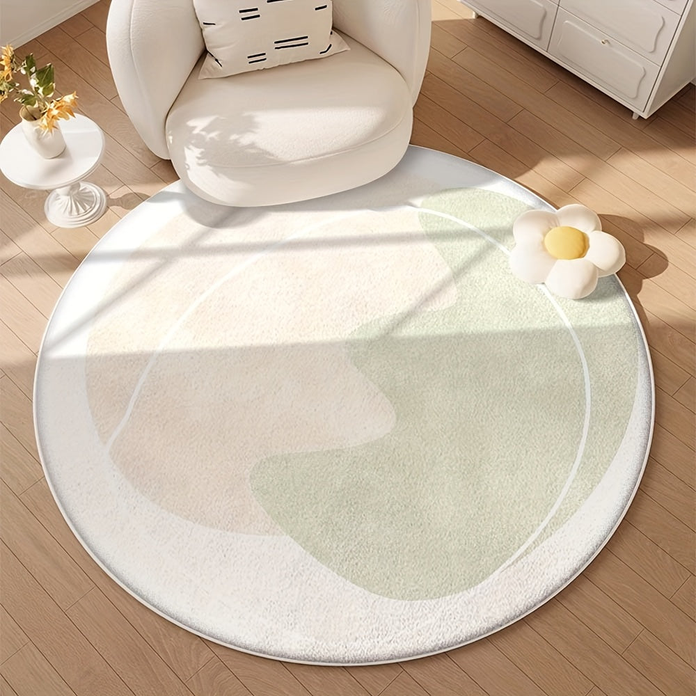 Tapis rond ivoire à grand galet sauge, peinture en lavis