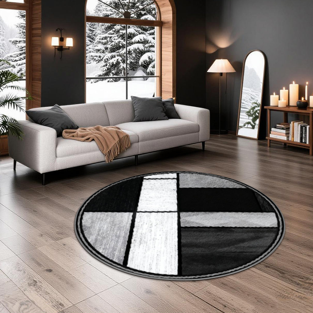 Tapis rond géométrique noir, gris et blanc, fond à pois